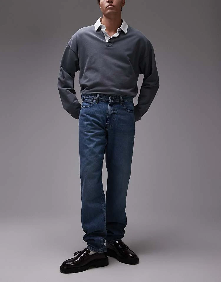 Mango Tapered Fit Jeans In Mid Blue For Men 3 Mango Tapered Fit Jeans In Mid Blue For Men