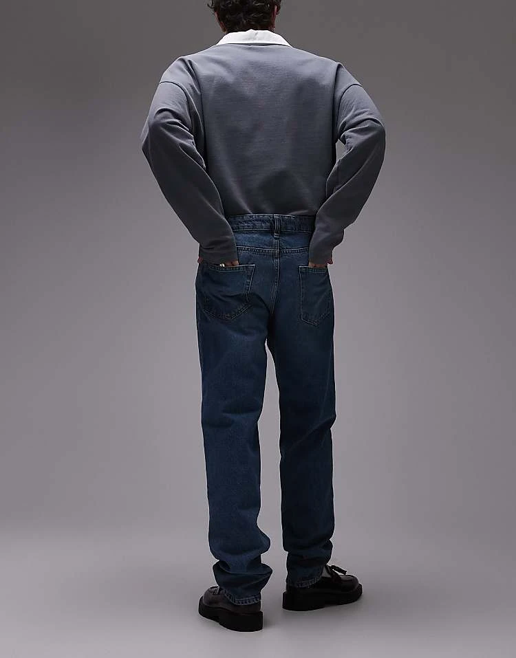 Mango Tapered Fit Jeans In Mid Blue For Men 4 Mango Tapered Fit Jeans In Mid Blue For Men - Image 2